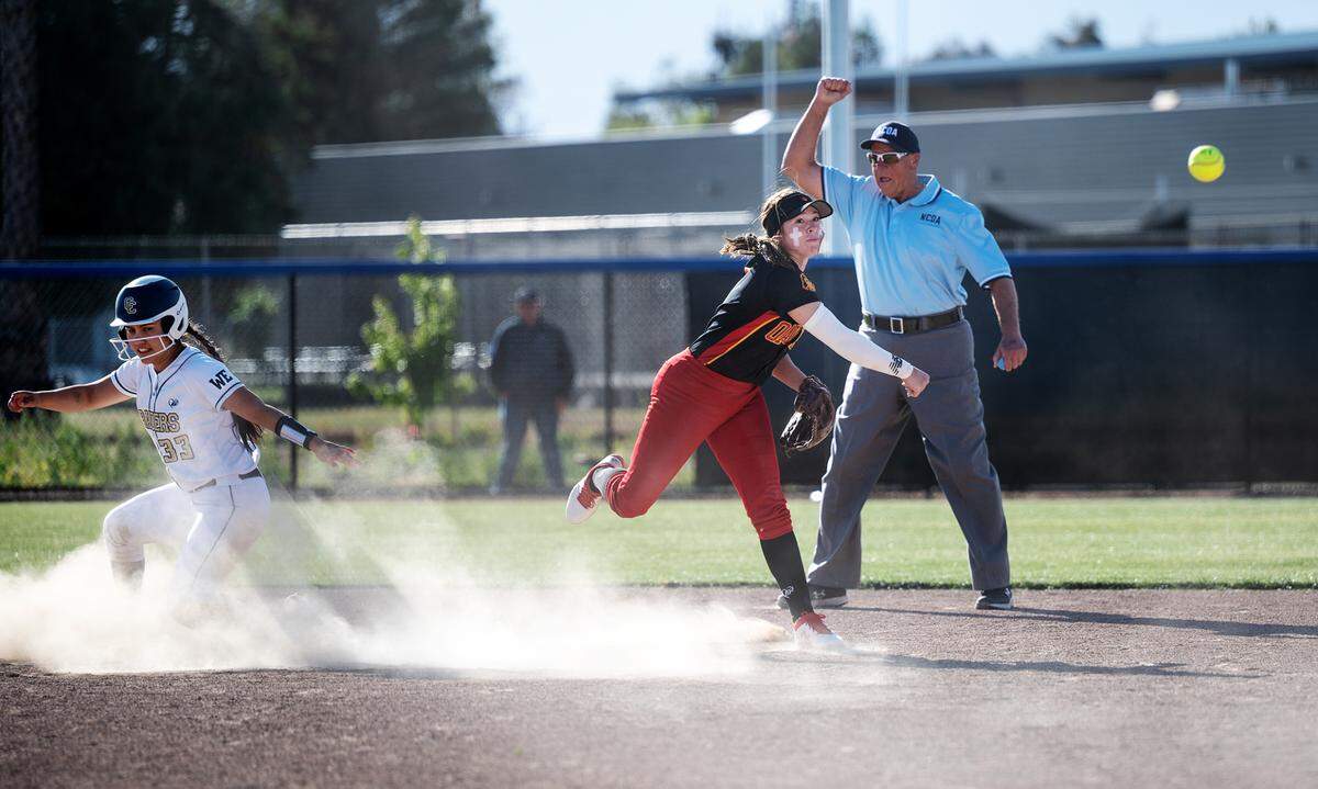 Oakdale’s Amanda Bricker forces out Central’s Sarah Soto during the Valley Oak League game at Central Catholic High School in Modesto, Calif., on Tuesday, May 10, 2022. Central Catholic won the game 2-1.