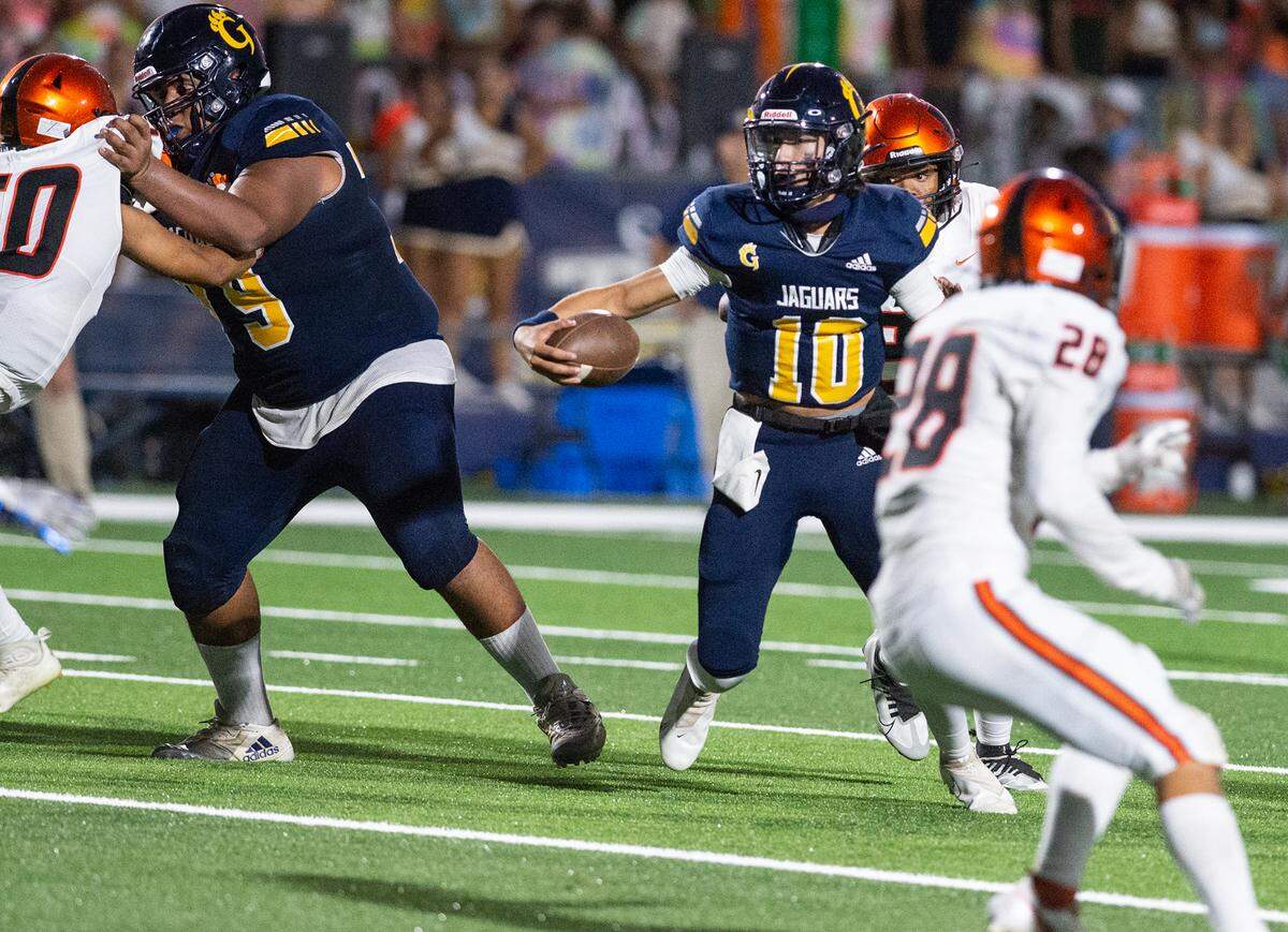 Gregori quarterback Conner Bailey runs the ball during the non-league game with Merced at Gregori High School in Salida, Calif., on Friday, August 26, 2022.