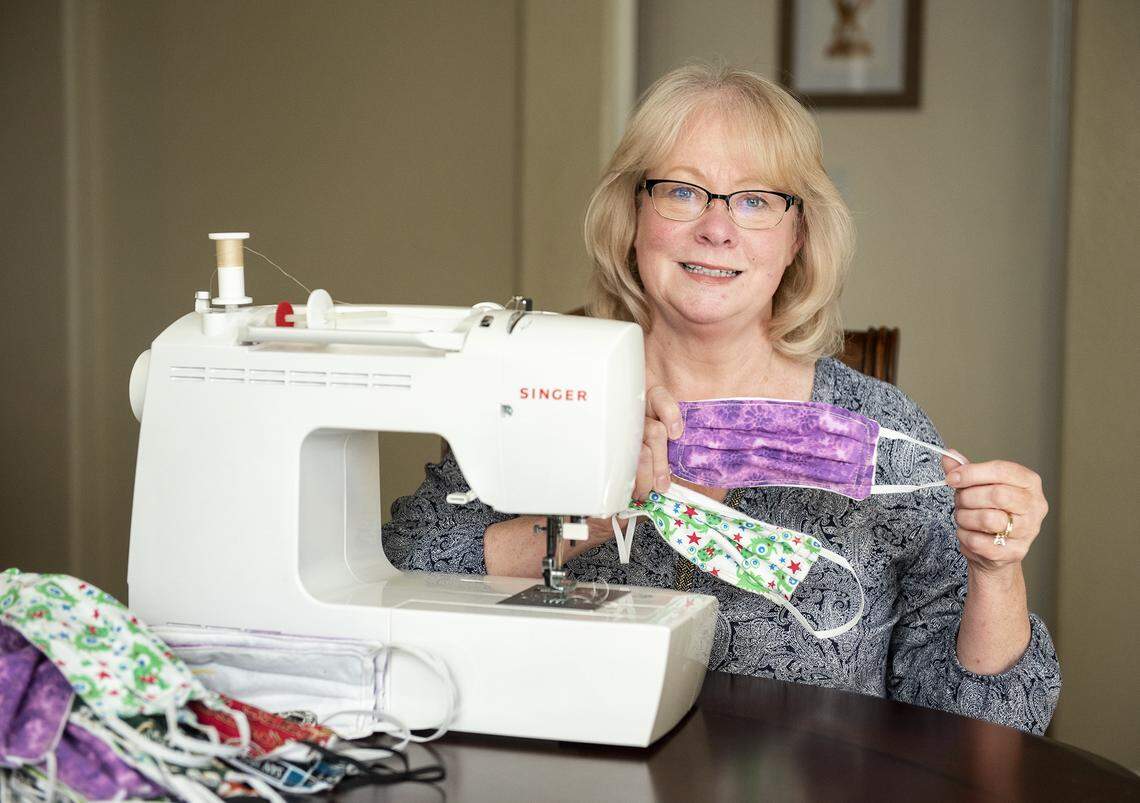 Barbara Vargo has been sewing face masks during her time under the coronavirus stay-at-home order in Oakdale, Calif., on Friday, March 27, 2020.