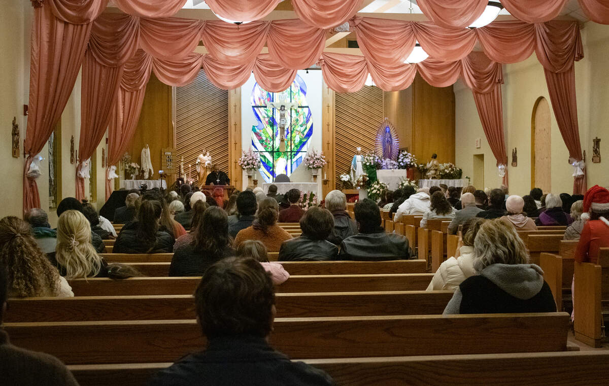 Father Avila introduces guest speakers at the “Silence is Complicity” interfaith vigil at St. Francis of Rome Catholic Church in Riverbank on Dec. 13.