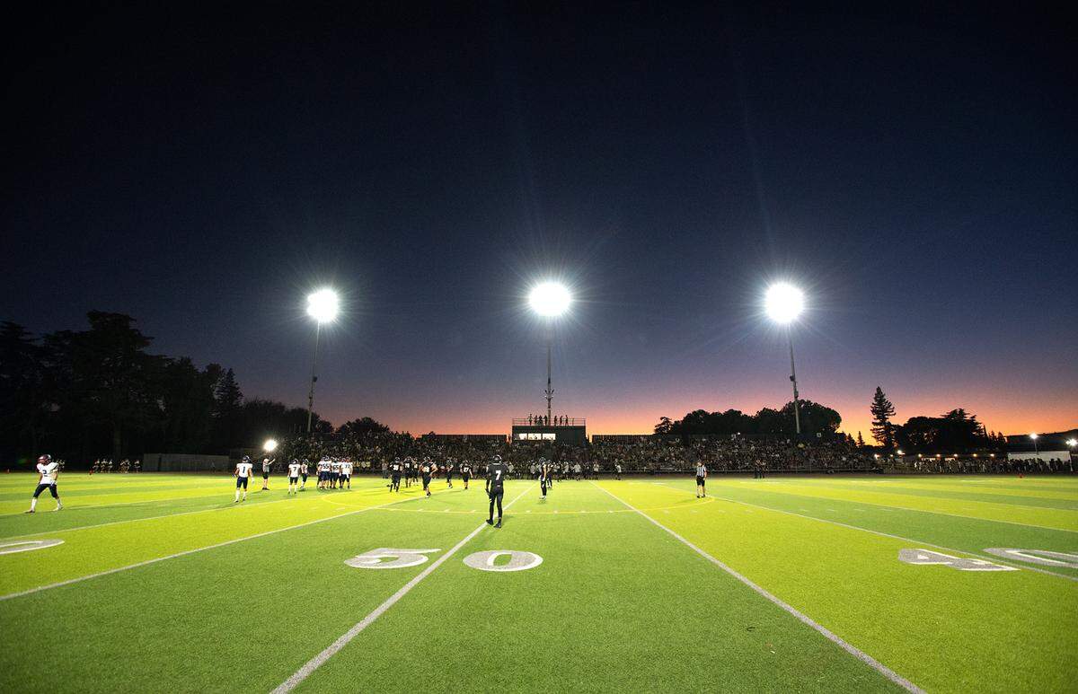Enochs and Beyer face off during the Sylvan Bowl at Downey High School in Modesto, Calif., on Friday, August 19, 2022.