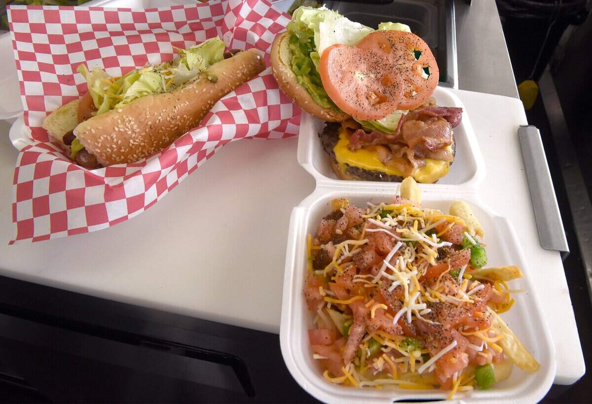 Knockout items (hot dog, fries and burger) are pictured at Scenic Drive-In in Modesto, Calif., in the 2017 photo.