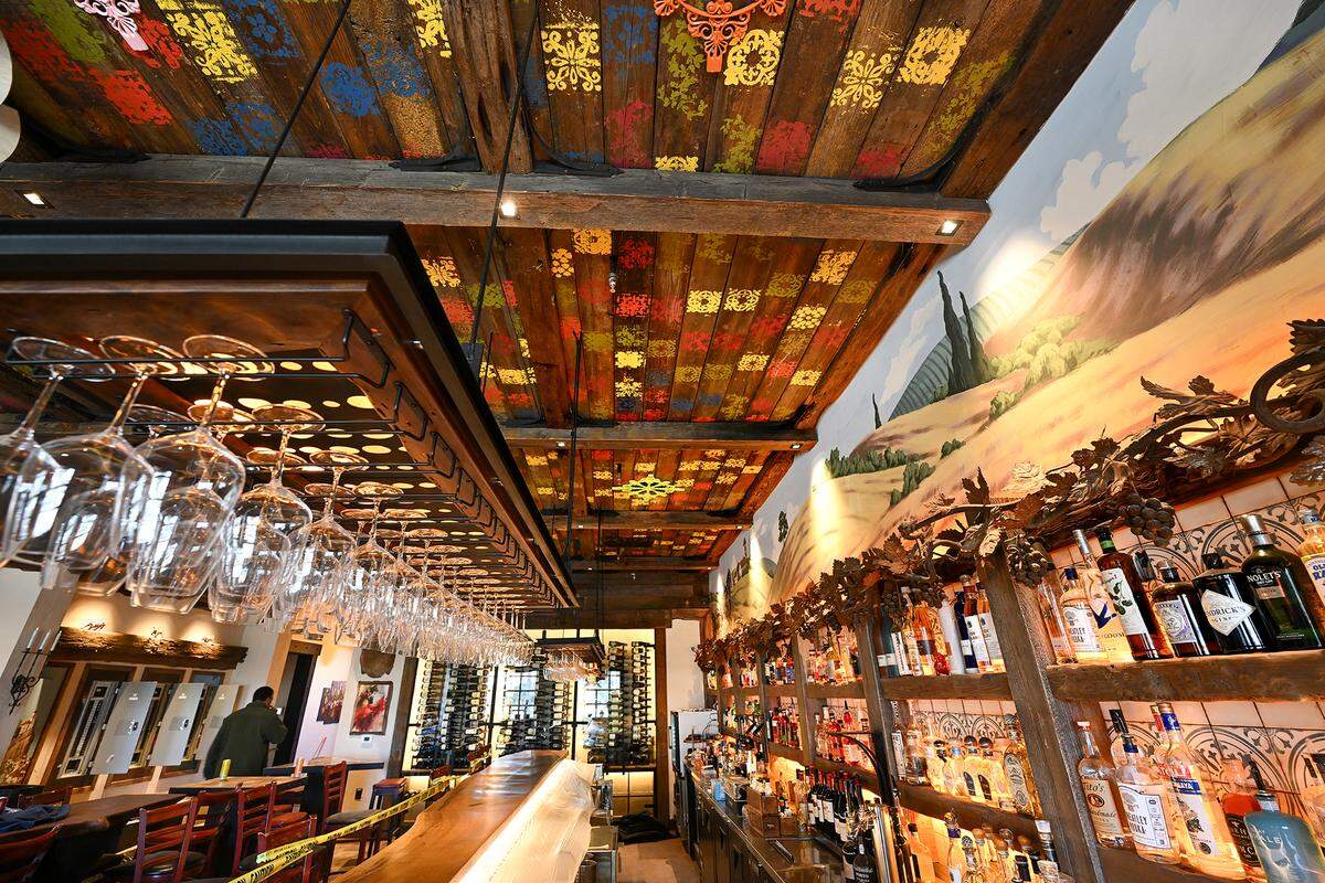 The grandchildren of owner Ed Maring stenciled the ceiling of the bar at The Old Water Office restaurant in Patterson, Monday, Jan. 27, 2025.
