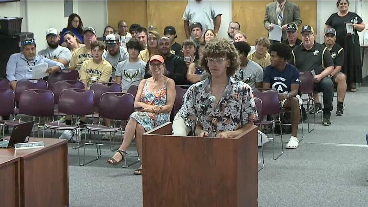 A vote on a high school facilities improvements bond measure drew Enochs High football players, families, coaches and boosters to the Modesto City Schools board meeting Monday night, June 20, 2022. Here, Enochs student Gavin Prutch addresses trustees.