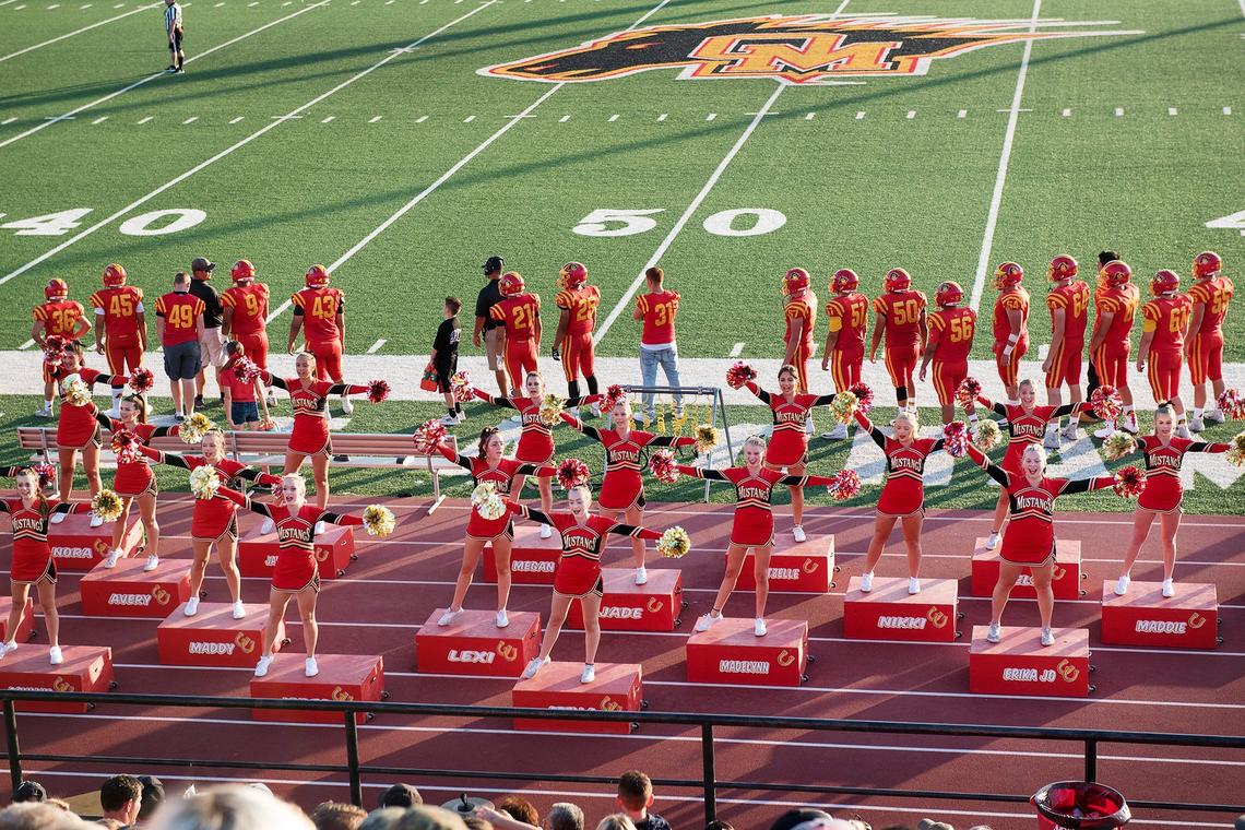 Oakdale cheerleaders perform during the non-conference league game with Sonora in Oakdale, Calif., Friday, August 17, 2018.