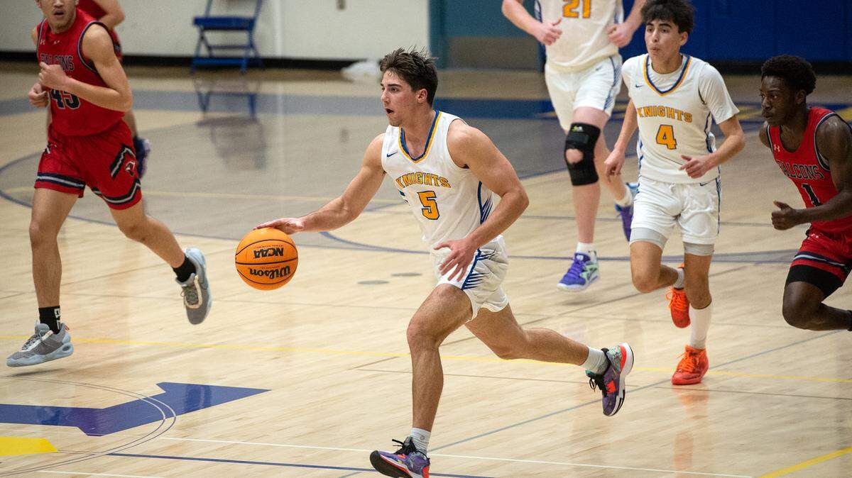 Ripon Christian’s Trey Fasani moves the ball up the court during the Sac-Joaquin Section Division V semifinal game with Vacaville Christian at Ripon Christian High School in Ripon, Calif., Wednesday, Feb. 22, 2023.