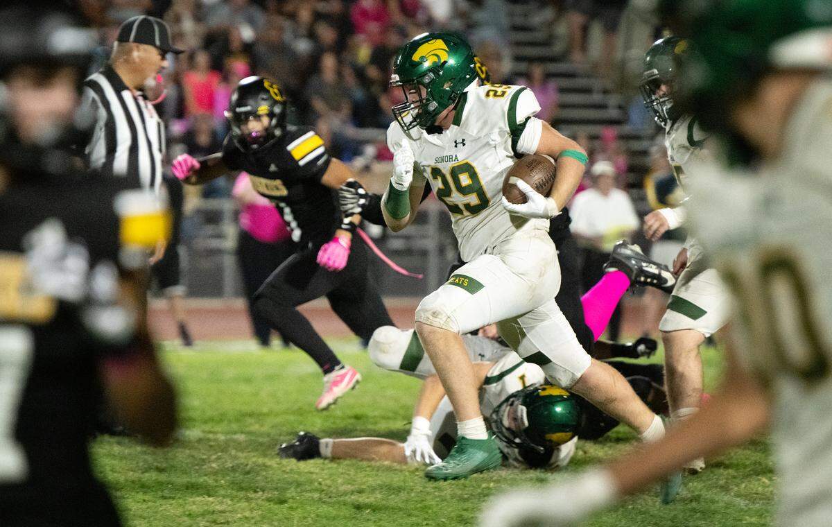 Sonora’s Tommy Sutton scores a touchdown on a run during the Trans Valley League game with Hughson in Hughson, Friday, Oct. 11, 2024.