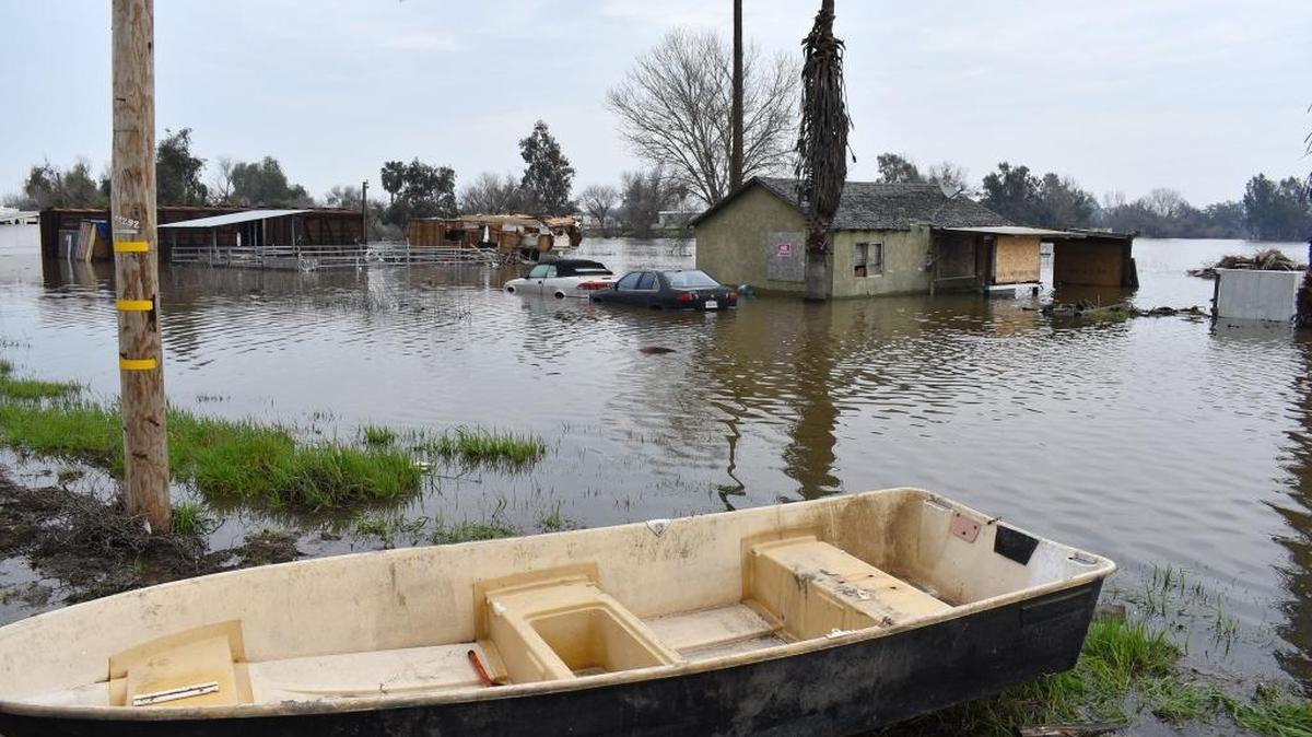 The San Joaquin River floods near the Fisherman’s Bend River Campground along River Road northeast of Newman on Feb. 15.