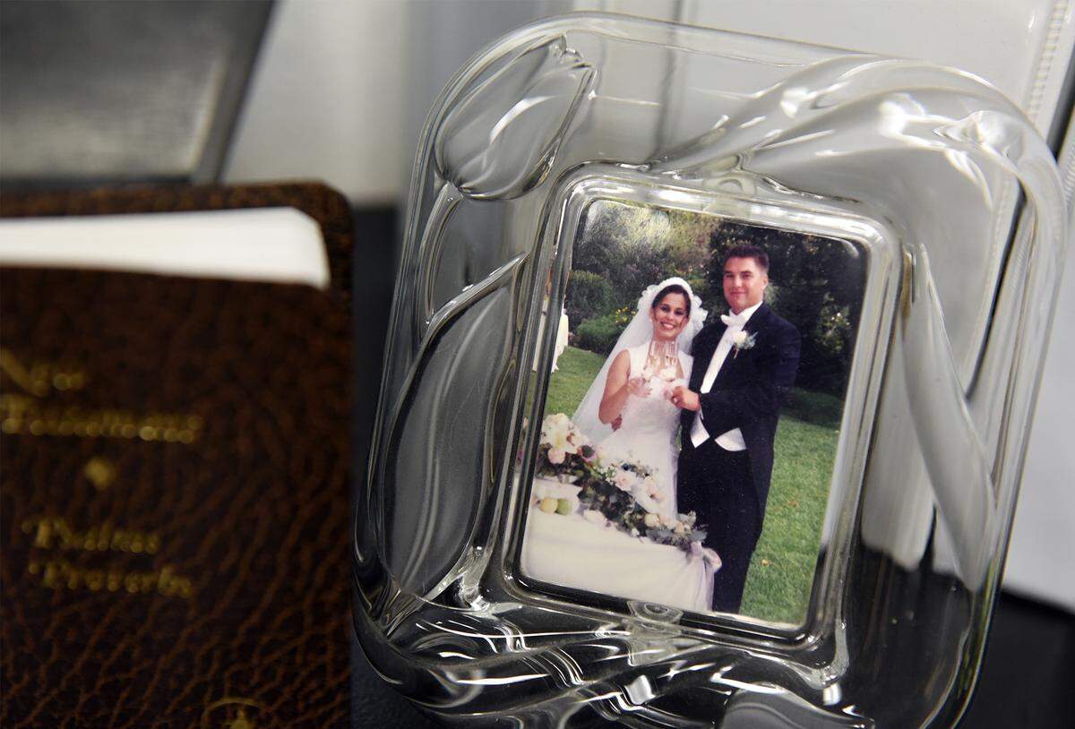 A framed wedding photo of Laci and Scott Peterson is pictured Thursday July 26, 2018 in a room in an office at Janey Peterson’s family business in Poway, Calif. The room holds trial transcripts, maps, pictures and timelines to support her argument that Scott Peterson is innocent in the murders of his wife Laci and their unborn son Conner.