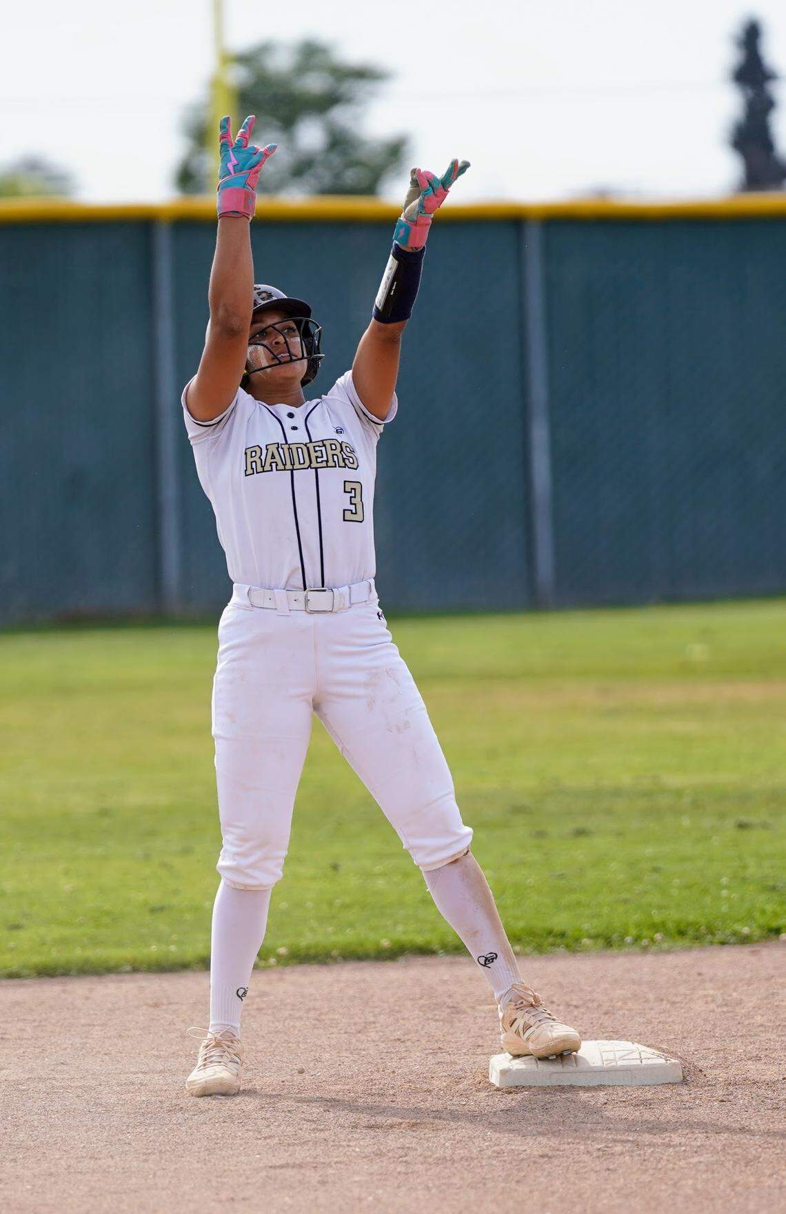 Central Catholic’s Jazmarie Roberts celebrates after hitting a double during a Valley Oak League game against Manteca at Manteca High School on Tuesday, April 22, 2025.