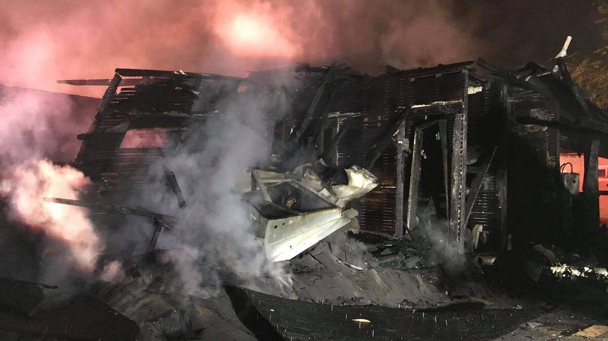 The charred remains of a house on the 200 block of Angelus Street in Turlock after a fire destroyed the structure and sent one man to the hospital. 