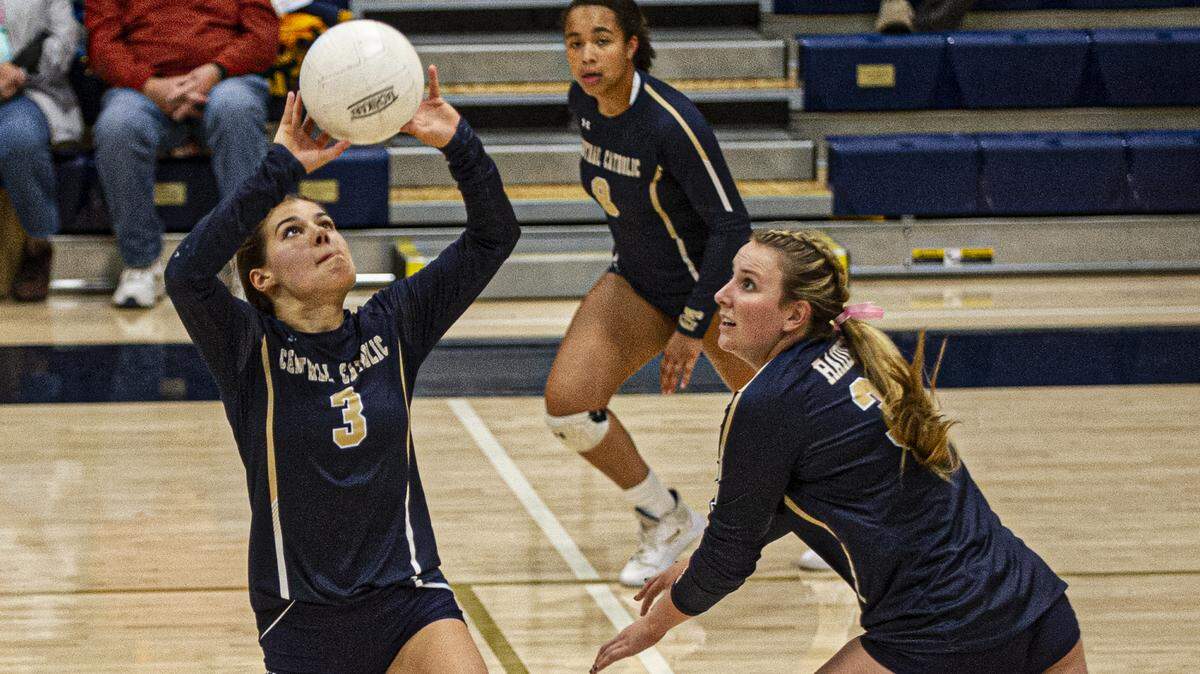 McKenzie Lettice (3) sets the ball for her teammates looking for a kill, during a playoff game between Sonora and Central Catholic, in Modesto, on Thursday, October 31.