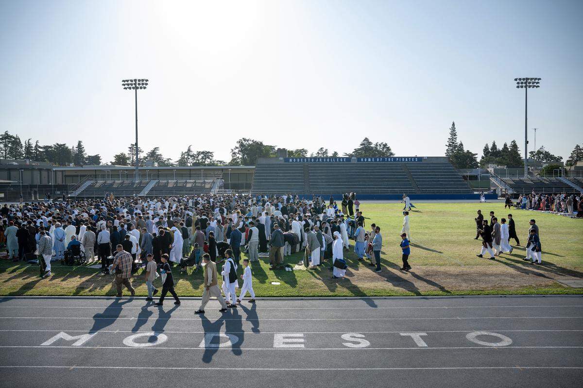 Muslim community members participate in an Eid prayer at Modesto Junior College in Modesto, Friday, June 6, 2025.