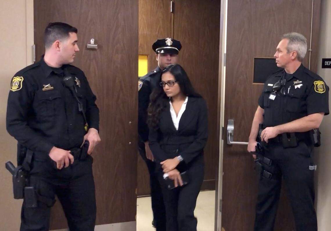 Anamika Singh leaves department 12 of the Stanislaus County Superior Courthouse in downtown Modesto, Calif. on Monday December 31, 2018 after the arraignment of accomplices in her husband Ronil Singh’s (Newman Police Cpl.) shooting death.