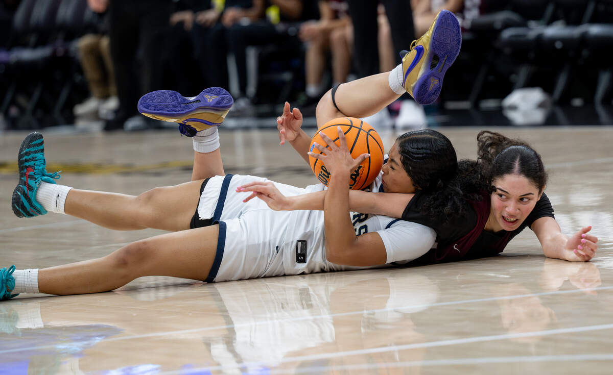 Central Catholic’s Samantha Nichols steals the ball from West Campus’ Naomi Johnson in the Sac-Joaquin Section Division IV championship game at the Golden 1 Center in Sacramento, Friday, Feb. 27, 2026.