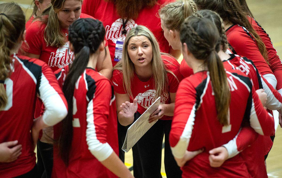 Ripon head coach Casey Kresge talks with her players on a timeout during the Sac-Joaquin Section Division 4 Section final at Modesto Junior College in Modesto, Calif., Saturday, Nov. 5, 2022. Ripon won the title 3-1.