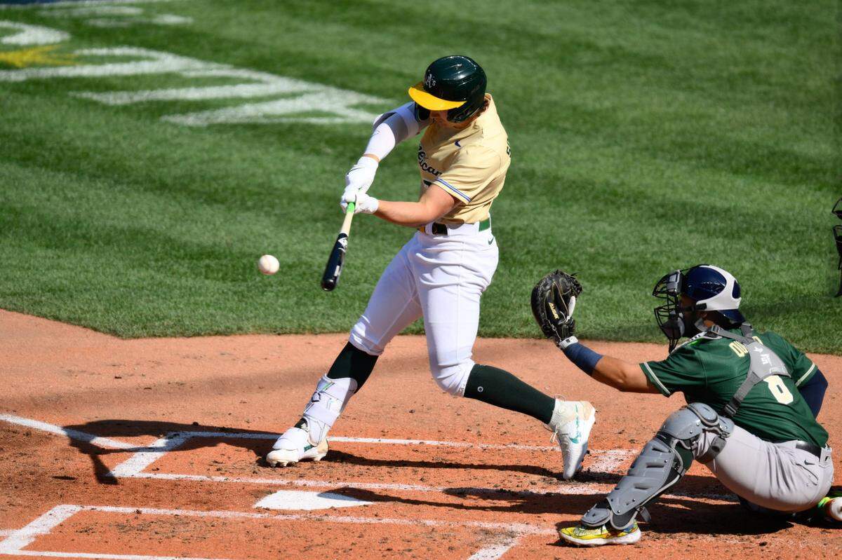 American League Futures first baseman Tyler Soderstrom (21) of the Oakland Athletics hits a single against the National League during the second inning of the All Star-Futures game at T-Mobile Park.
