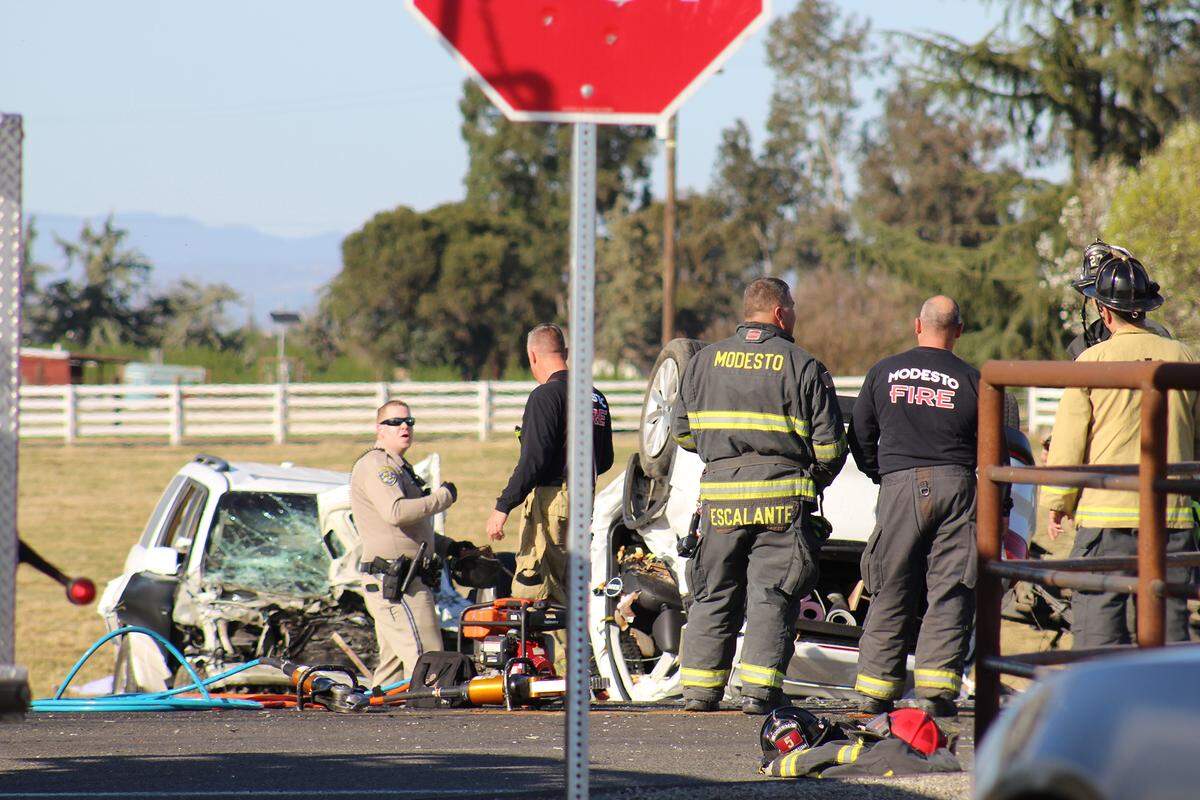 Authorities investigate a fatal crash at Bentley and Patterson roads between Riverbank and Oakdale, Calif., on Saturday, March 12, 2022.