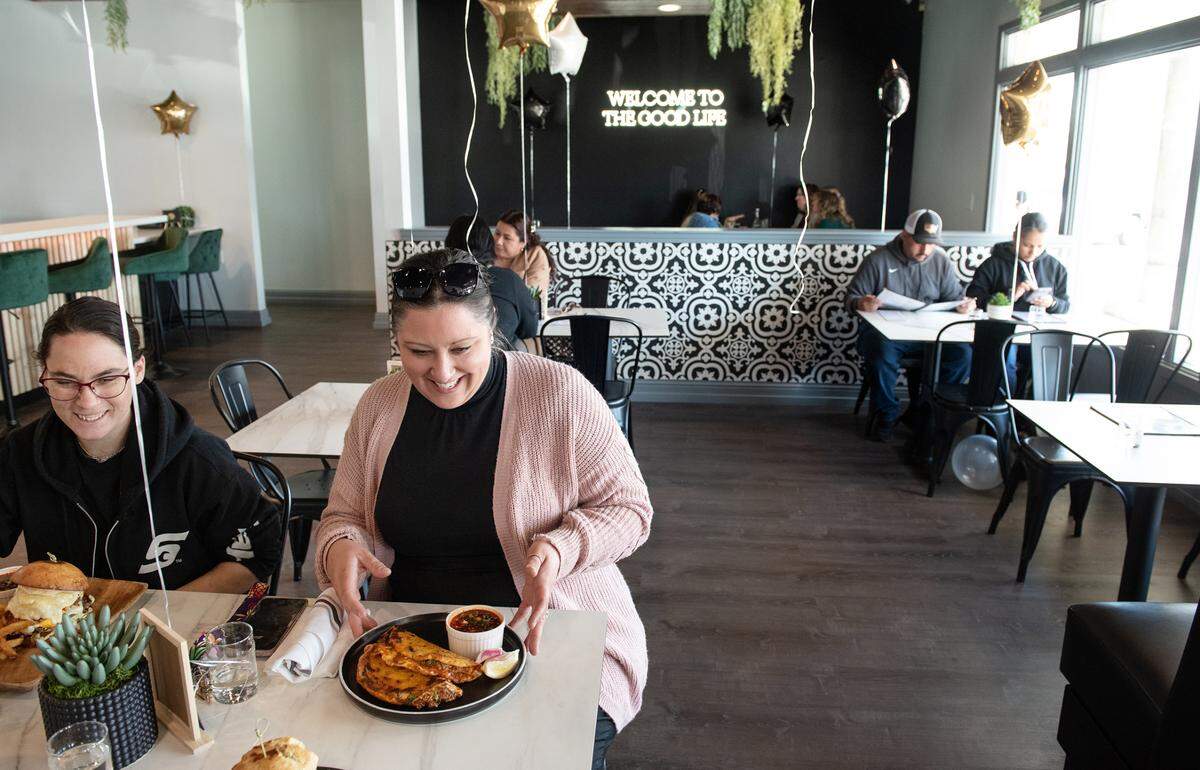 Jennifer Young, right, and Miranda Dunn, left, have lunch at El Bistro by Salt and Pepper on Carpenter Road in Modesto, Calif., Thursday, April 13, 2023.