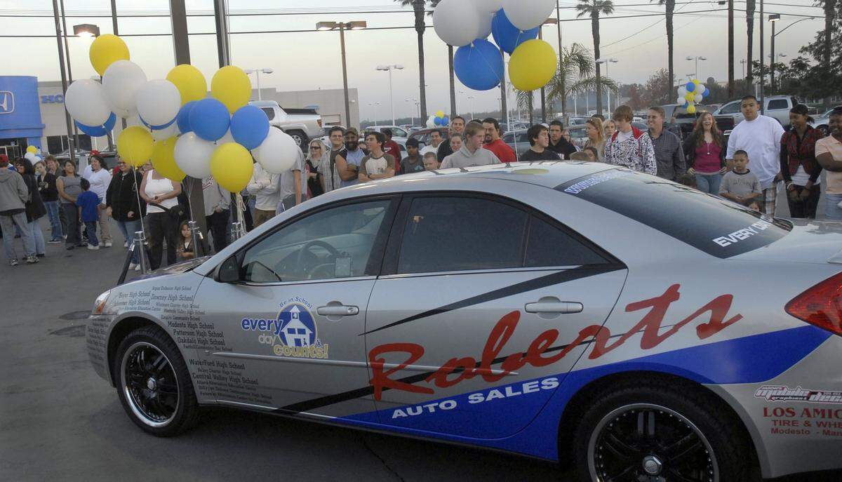 The Stanislaus County Office of Education gave away 10 Nano ipods and unveiled a new 2007 Pontiac G6 to be awarded at the end of the 2007-08 school year for good attendance.