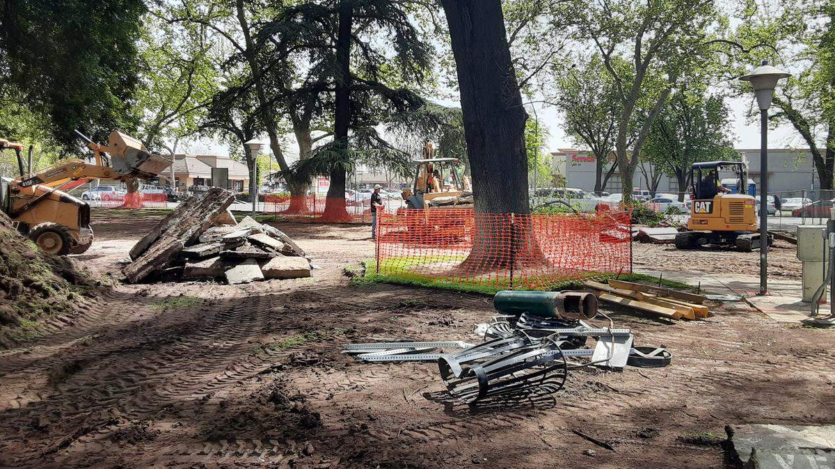 Workers were completing the demolition work Thursday, March 31, 2022, in Modesto’s Ralston Tower Park. It’s the first step in a $1.2 million makeover of the tiny park next to Ralston Tower, the low-income senior complex in downtown.