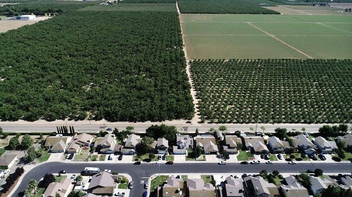 Murphy Road divides Salida, below, and Wood Colony, Calif., on Saturday, June 13, 2020.