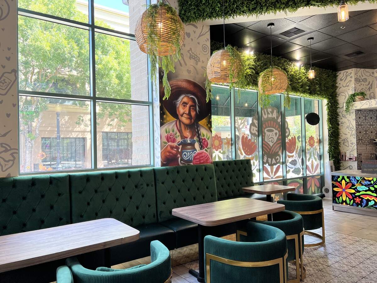 The menu at a Con Azucar Cafe features a mix of coffee, sandwiches, sweets and more.