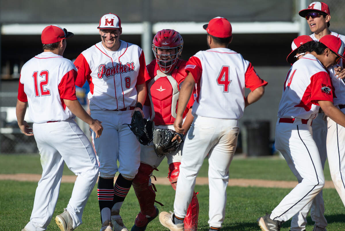 Modesto players celebrate their 6-3 victory over Ripon Christian the Windemuth Tournament championship game at Modesto High School in Modesto, Calif., Thursday, April 13, 2023.