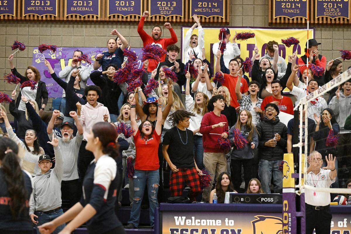 The Beyer High student section erupts after Beyer won game two over Escalon in the D-III quarterfinal playoff match at Escalon High School in Escalon, Calif., Thursday, Oct. 26, 2023.