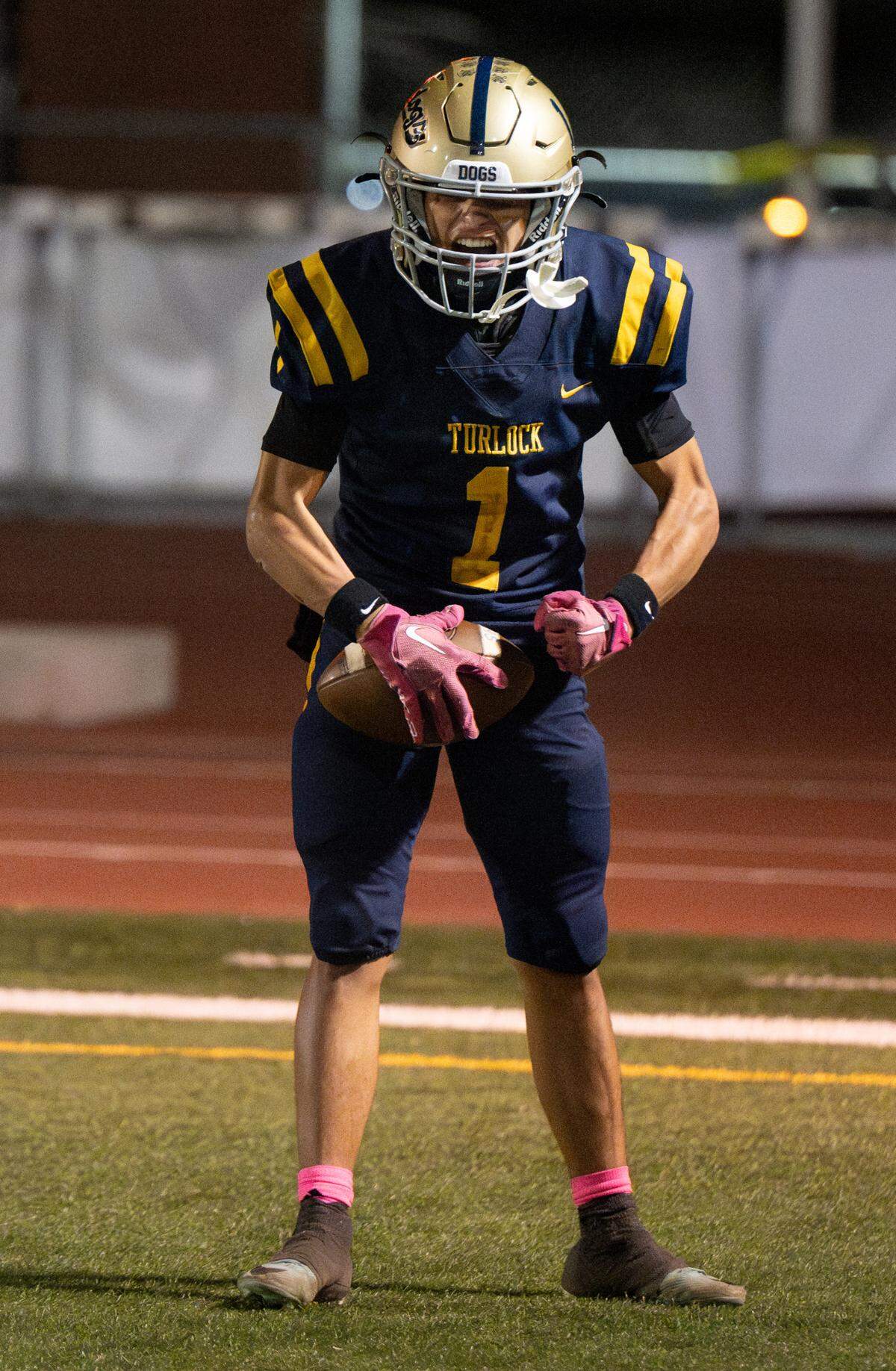 Turlock’s Jr. Silva celebrates a touchdown during the Central California Athletic League game with Downey at Turlock High School in Turlock, Friday, Oct. 18, 2024.