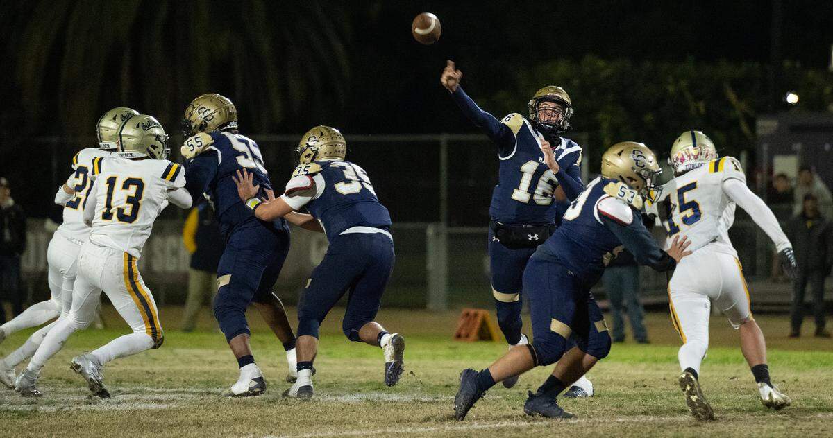 Central Catholic quarterback Kayden McHenry makes a pass during the Sac-Joaquin Section Division I playoff game with Turlock at Central Catholic High School in Modesto, Friday, Nov. 15, 2024.