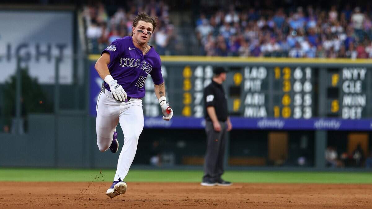 DENVER, CO - JUNE 9: Cole Carrigg #16 of the Colorado Rockies runs to third base with a triple in the fifth inning against the Chicago Cubs at Coors Field on June 9, 2026 in Denver, Colorado. Carrigg earned his first hit on the play in his Major League debut. (Photo by Justin Edmonds/Getty Images)