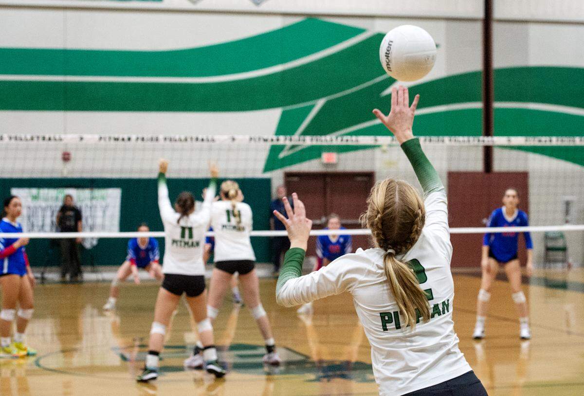 Pitman’s Aila Reich serves the ball during the CIF Sac-Joaquin Girls Volleyball Division 1 playoff match at Pitman High School in Turlock, Calif., Thursday, Oct. 27, 2022. Pitman won the match 3-1.