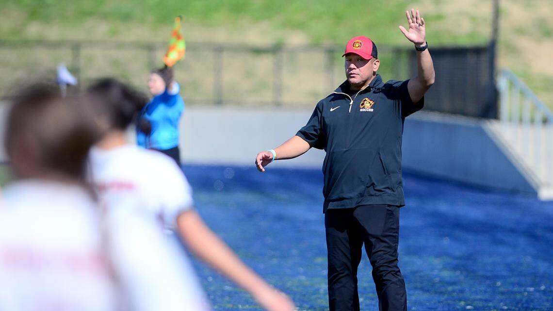 Oakdale head coach Kico Monares signals to his players during the Sac-Joaquin Section Division III Championship between Oakdale High School and Roseville High School at Cosumnes River College in Sacramento, Calif. on Saturday, March 1, 2025.