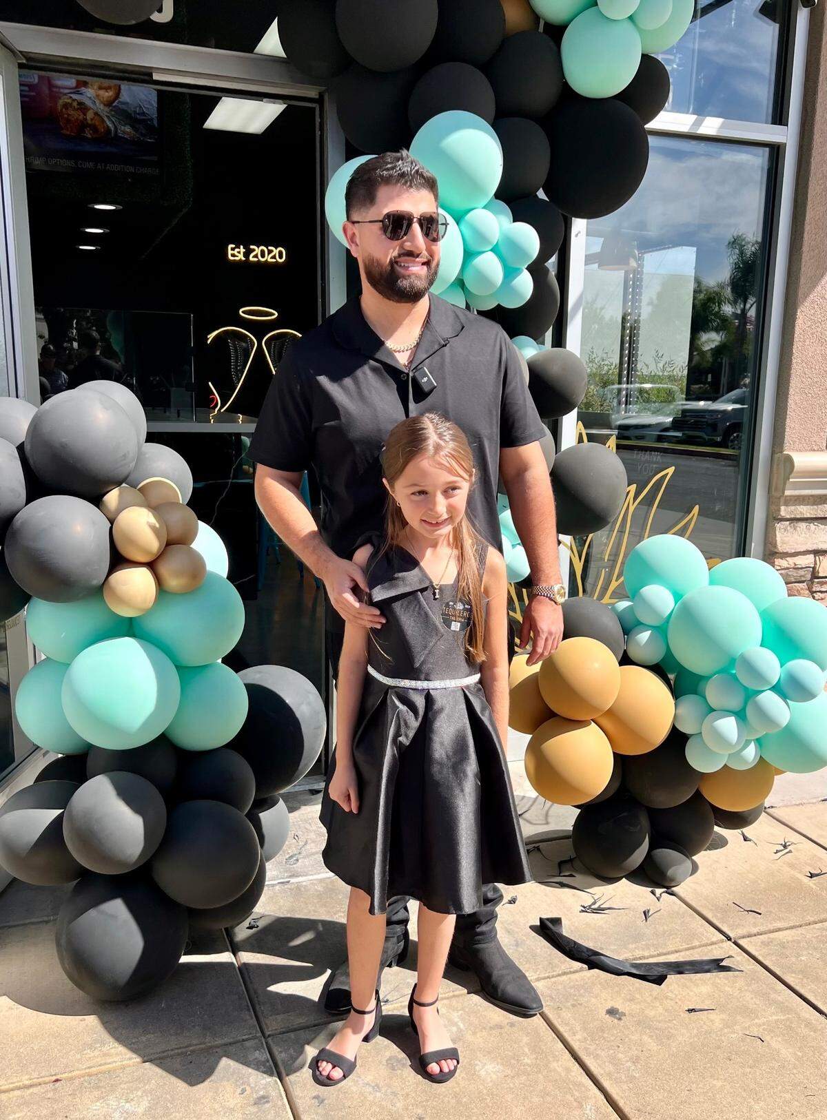 Taquileros Taquería owner Edgar Gomez and his daughter, Italia, at the restaurant’s grand opening in Salida on Sept. 15, 2024.