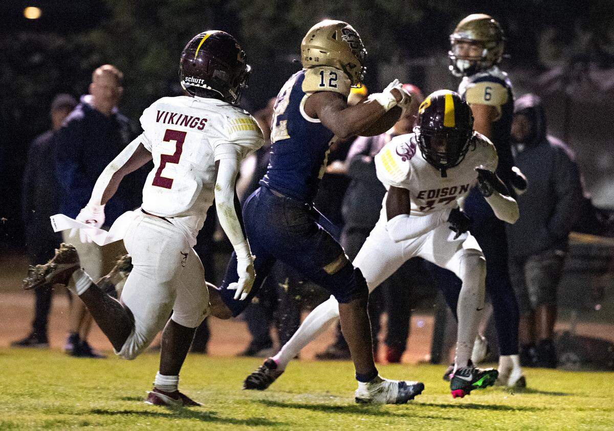 Central Catholic’s Joey Alcutt scores a touchdown on a run during the Sac-Joaquin Section Division I quarterfinal game with Edison at Central Catholic High School in Modesto, Calif., Friday, Nov. 10, 2023.