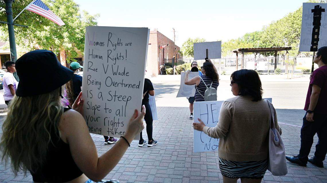 Abortion rights advocates protest outside Turlock City Hall in Turlock, Calif., on Tuesday, June, 28, 2022.