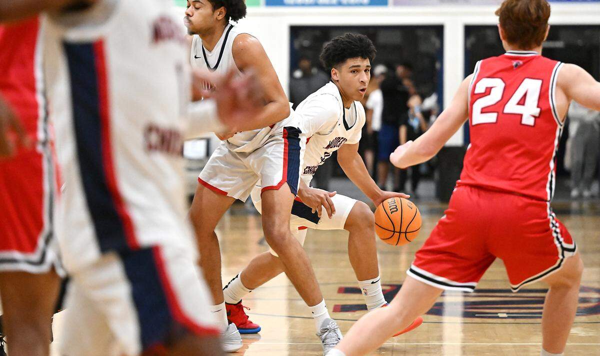 Modesto Christian’s Gavin Sykes moves the ball during the Tri-City Athletic League game with Lincoln at Modesto Christian High School in Salida, Calif., Friday, Jan. 12, 2024. Modesto Christian won the game 68-53.