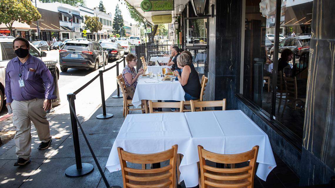 Outdoor seating has been added to accommodate diners at Tresetti’s Restaurant in Modesto, Calif., on Thursday, July 2, 2020.