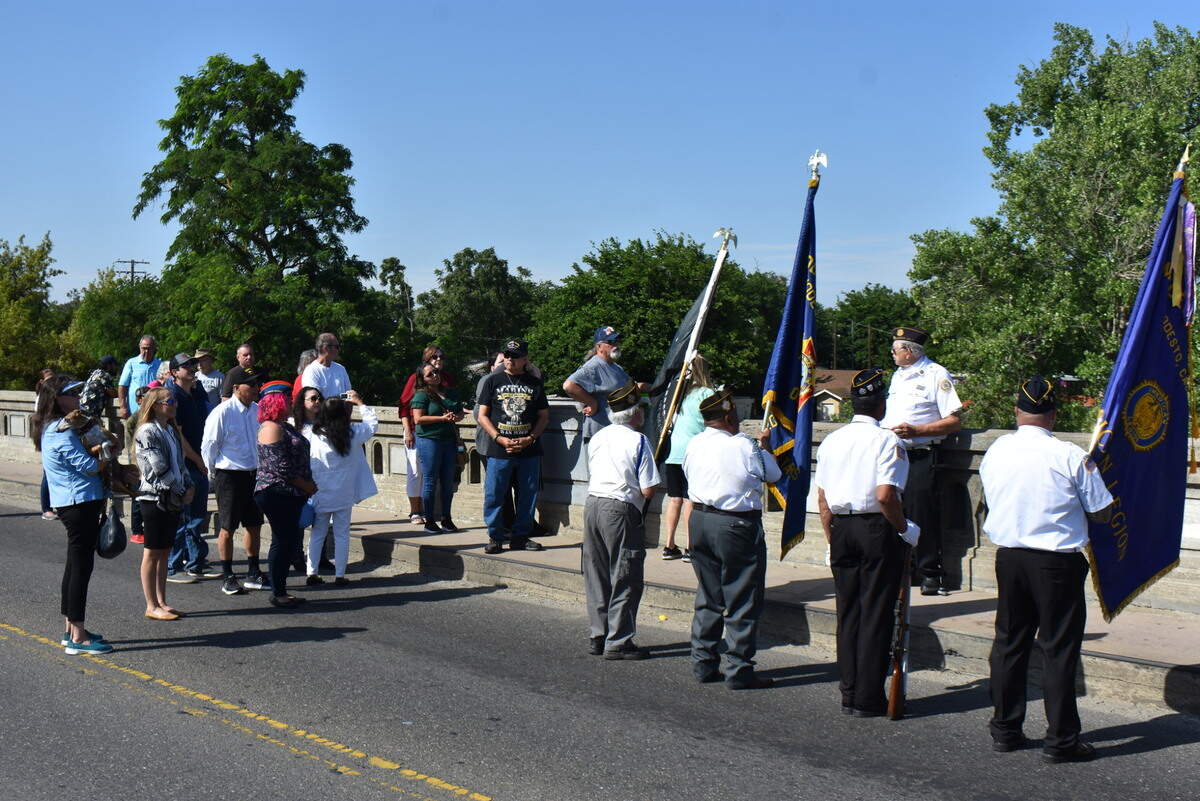 Air Force veteran Bill Shanahan, of American Legion Post 74, addresses attendees of a Memorial Day commemoration on the Seventh Street bridge across the Tuolumne River in Modesto for a Memorial Day commemoration on Monday, May 29, 2023.
