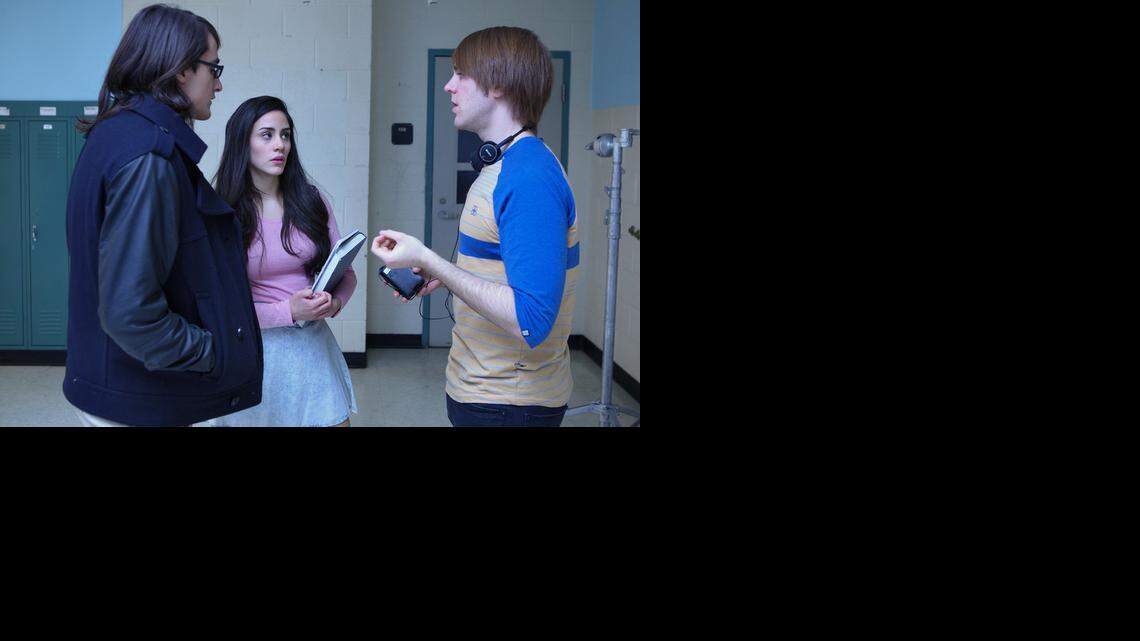 Drew Monson, left, talks with director Shane Dawson in a production still from the Starz series “The Chair.”