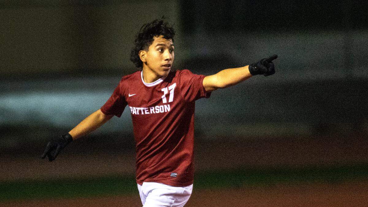 Patterson’s Johan Mendoza signals to teammates after scoring a goal in the Central California Conference game with Central Valley in Patterson, Calif., on Wednesday Jan. 12, 2022. Patterson won the game 4-1.