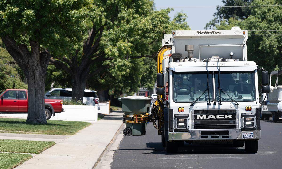 Bertolotti Disposal picks up garbage on Boyce Lane in Modesto, Calif., Friday, August 4, 2023.