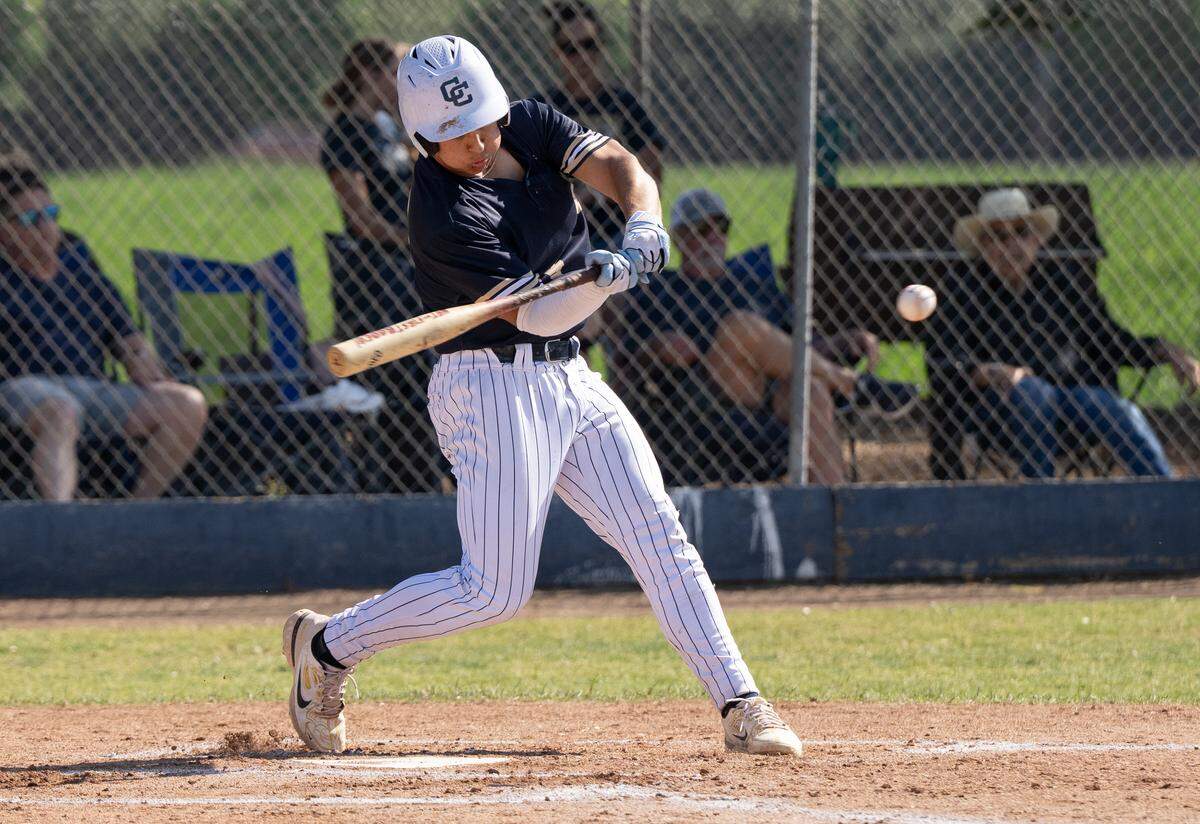 Central Catholic’s Broden Thomas singles during the Sac-Joaquin Section Division 3 playoff game with Bear Creek at Central Catholic High School in Modesto, Wednesday, May 7, 2025. Central won the game 10-6.