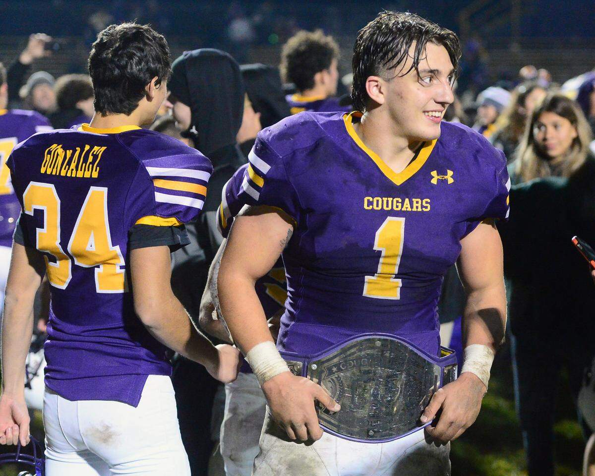 Escalon running back Ryker Peters celebrates the victory after the 2022 CIF NorCal Division 4-AA Bowl Game between Escalon High School and Pleasant Valley High School at Escalon High School in Escalon, Calif. on December 2, 2022. Escalon won the game 42-20.