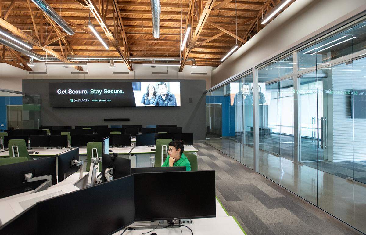 Lynne Stinnett works at the new Datapath office on J Street in Modesto, Calif., on Tuesday, Nov. 10, 2020.
