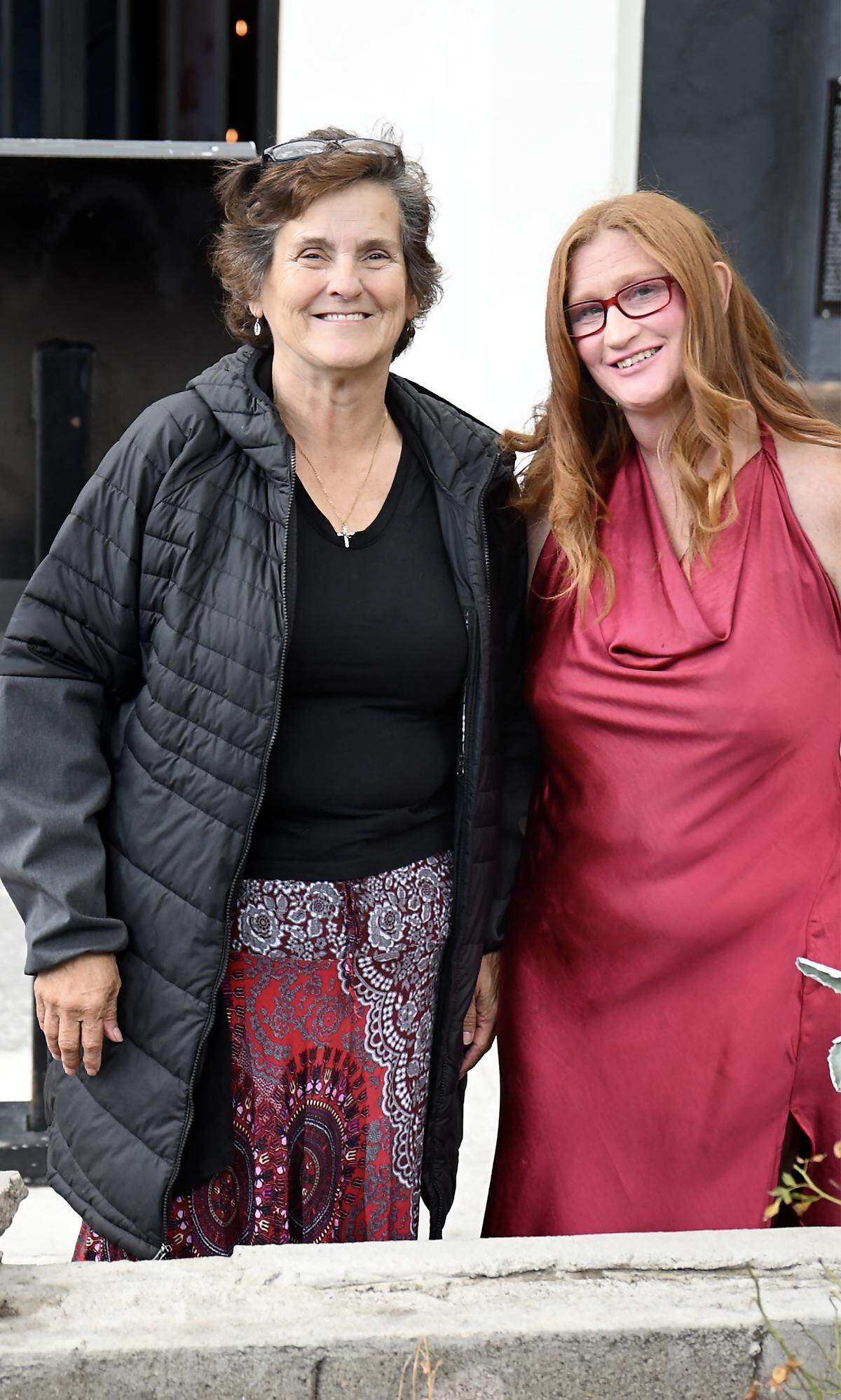 Living WELL program graduates Patricia Perez, left, and Nancy McGuire after a graduation ceremony in Modesto, Wednesday, Oct. 15, 2025. Both women are members of the Downtown Streets Team.