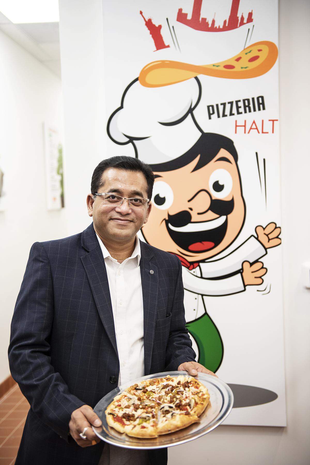 Owner Sam Duttaroy owner of the new vegan pizzeria, Pizzeria Halt, in Modesto, Calif., on Tuesday, Jan. 21, 2020.