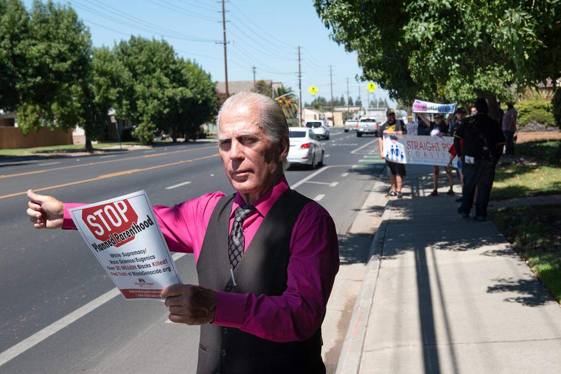 Straight Pride organizer Don Grundmann and other members of his coalition moved their event to Coffee Road in Modesto, Calif., on Saturday, August 27, 2022.