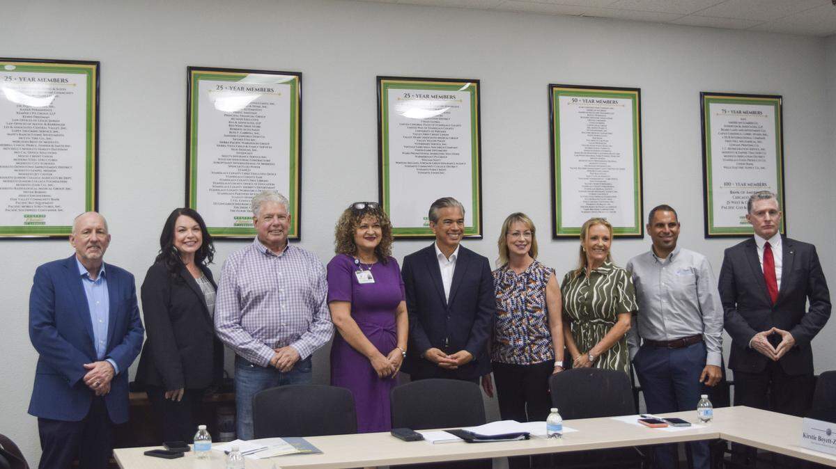 California Attorney General Rob Bonta (center) poses with Central Valley business leaders (left to right) Ed Wanket, Suzanne Devereaux, Bill Lyons, Yamilet Valladolid, Trish Christensen, Kirstie Boyett-Zacharias, Michael Gaffney and Frank Ferral at the Modesto Chamber of Commerce on March 19, 2026.